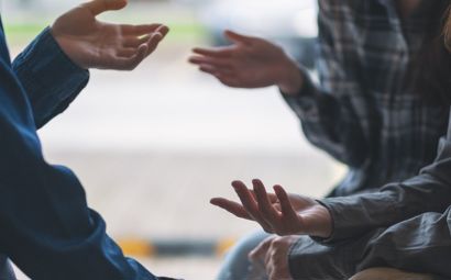 People having conversation together
