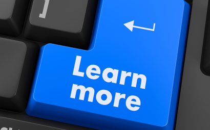 Computer keyboard with a 'learn more' button